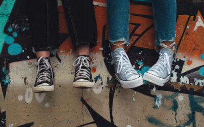 Two kids legs dangling