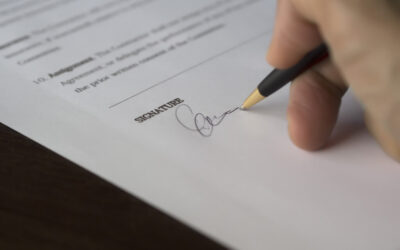Person signing a contract