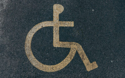 Disabled sign painted on road