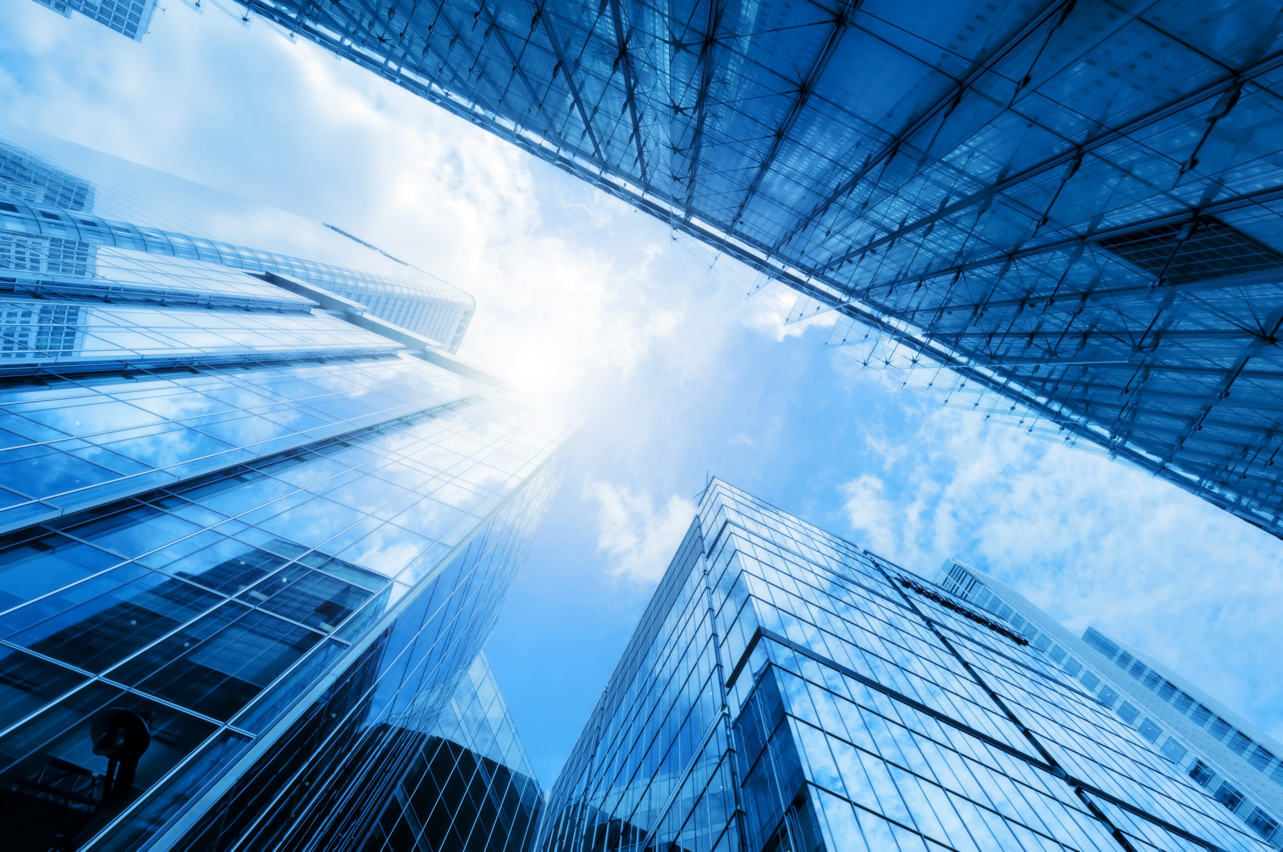Glass buildings in a city on a sunny day