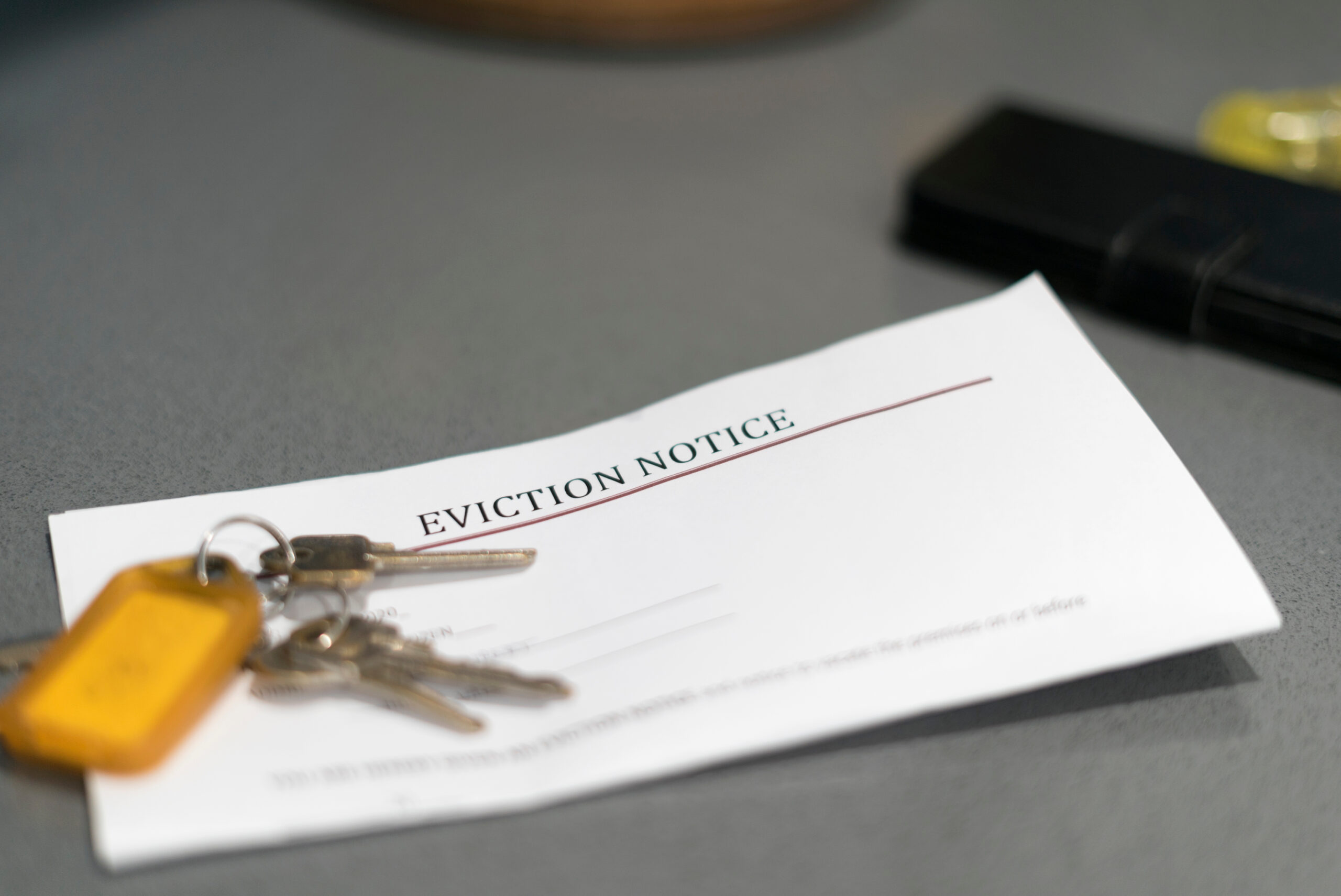 A section 8 letter titled Eviction Notice with a set of keys on top