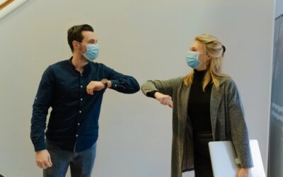 Two people working during the COVID-19 Pandemic