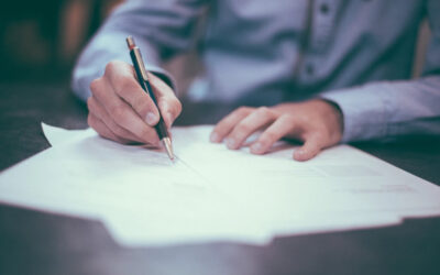 Man signing a contract