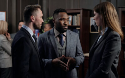 Three solicitors talking to each other