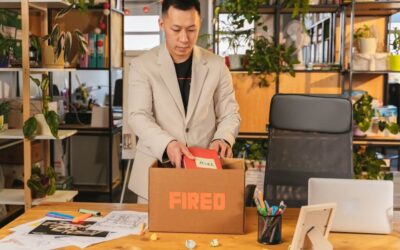 Fired worker packing up the stuff from their desk
