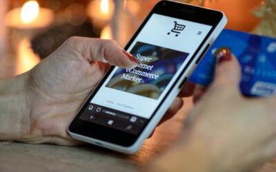 Person imputting their credit card details to an online store