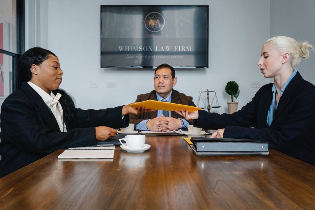 Judge and lawyers in a litigation meeting