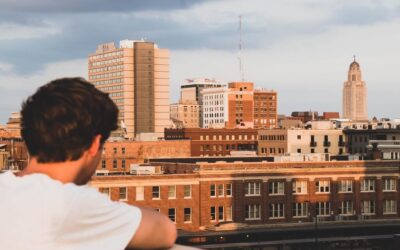 Man looking at buildings