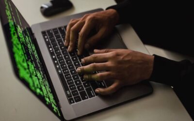 Scammer at laptop