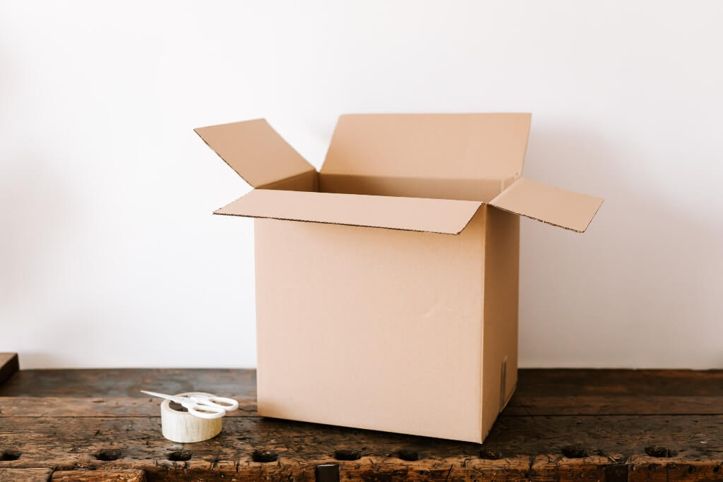 Cardboard Box of Work Belongings