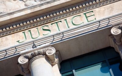 Marble pillars with Justice written on them