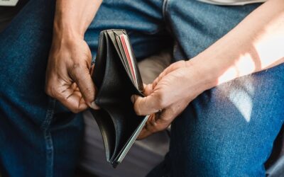 Man opening an empty wallet