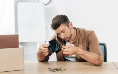 Working Personally Liable for Company Debts - Counting Pennies at Desk