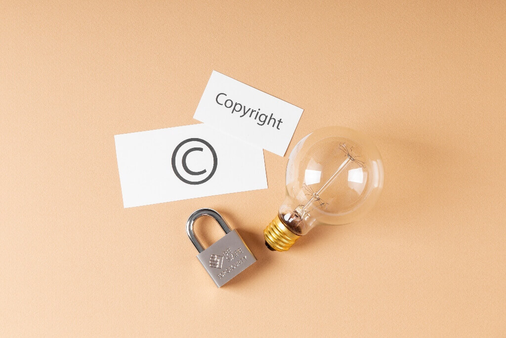 Lightbulb, copyright cards and padlock