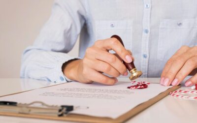 Person wax sealing a document