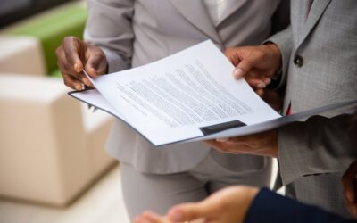 Business Partners Reading Commercial Contract Together