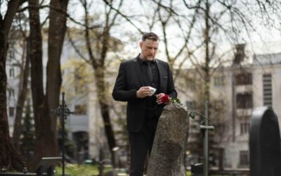 Man Paying Respects at Cemetery - Claiming Under the Inheritance Act 1975