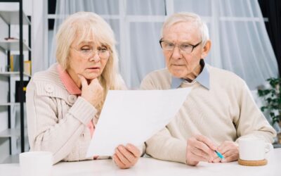 Contesting Your Parents Will - An Elderly Couple looking over their Will