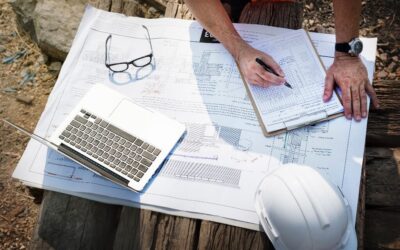 Site Engineer with Architectural Plans in Flatlay