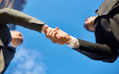 Two People Shaking Hands on an Asset